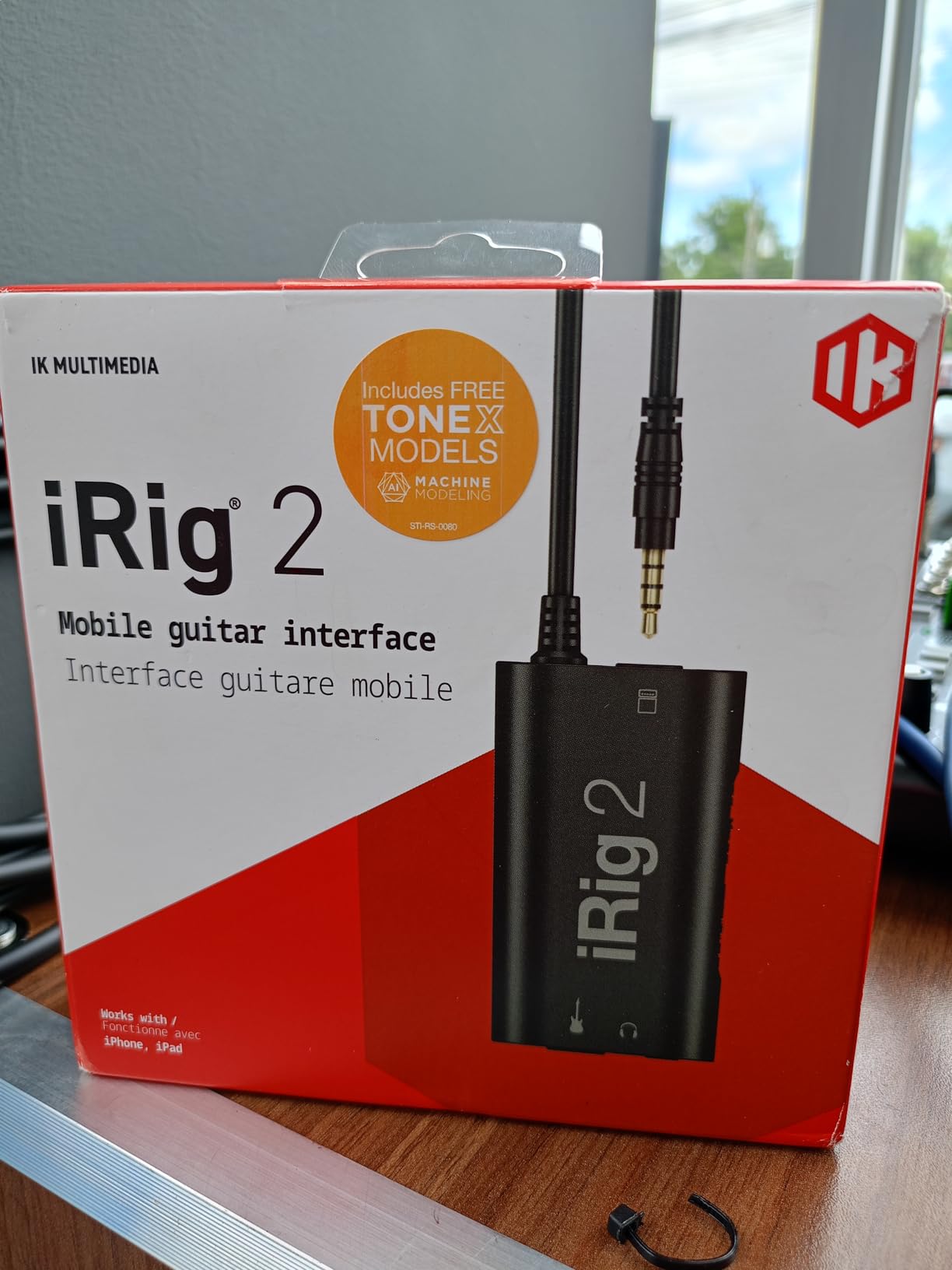 IK Multimedia iRig 2 portable guitar audio interface, lightweight audio adapter for iPhone and iPad with instrument input and headphone/amplfier outs customer photo 1