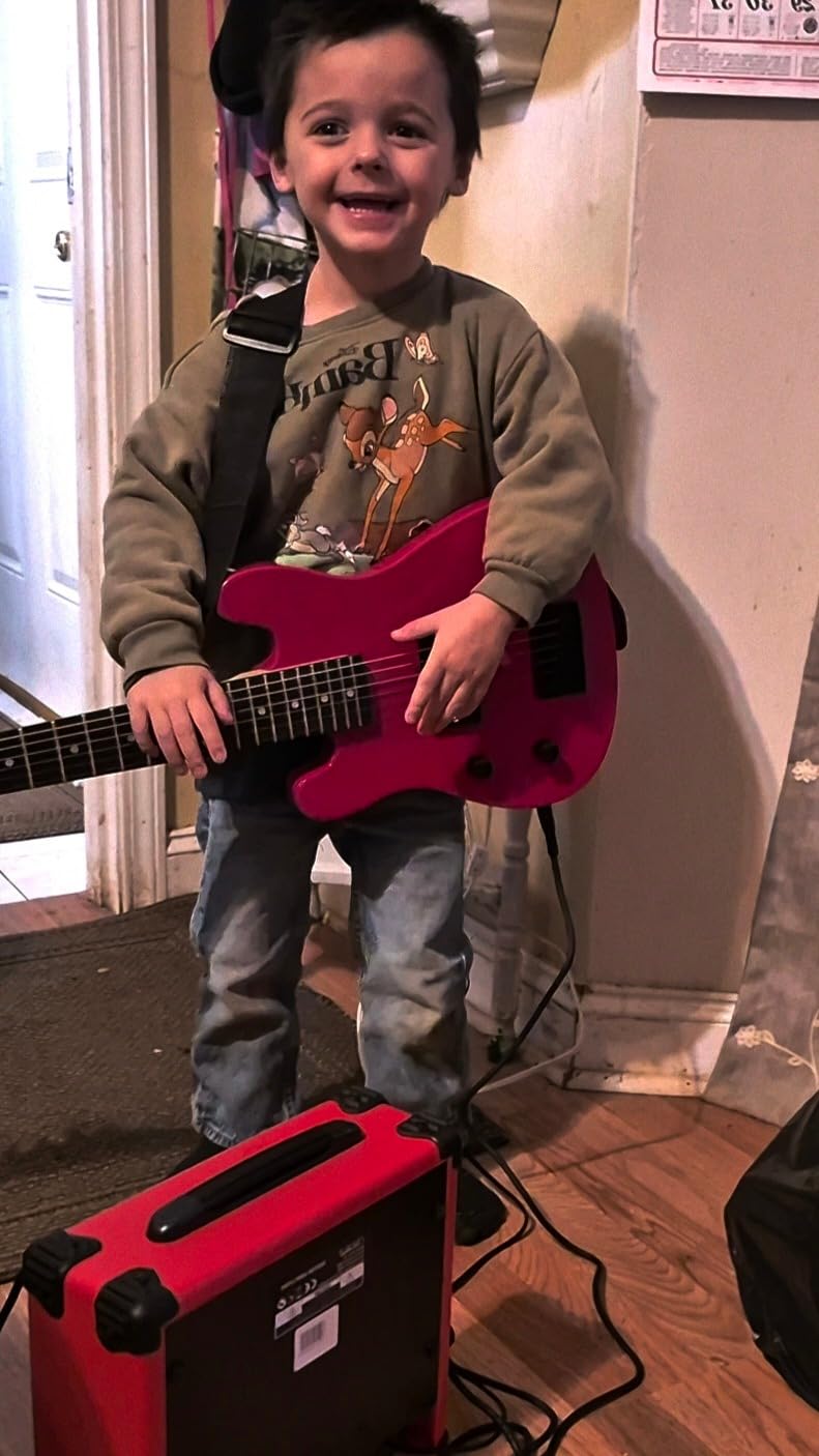 LyxPro 30 Inch Electric Guitar and Starter Kit for Kids with 3/4 Size Beginner’s Guitar, Amp, Six Strings, Two Picks, Shoulder Strap, Digital Clip On Tuner, Guitar Cable and Soft Case Gig Bag - Red customer photo 2