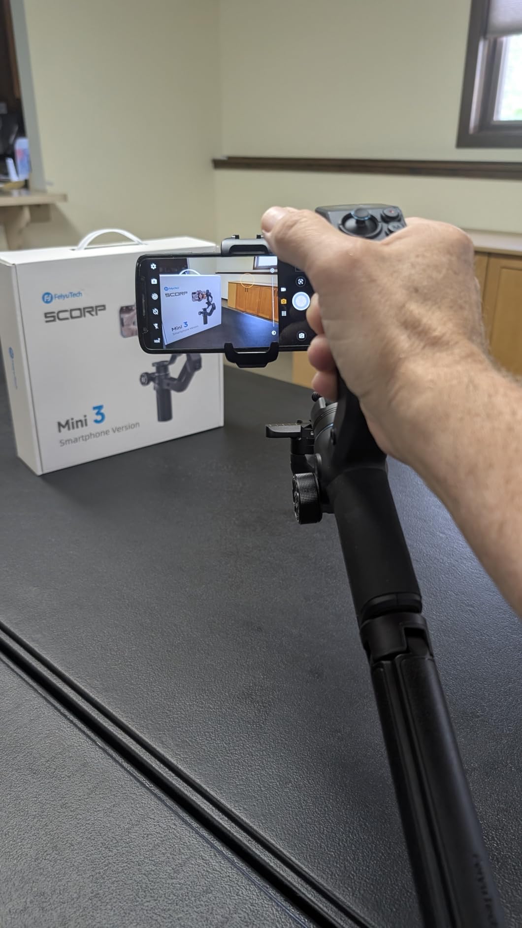 FeiyuTech SCORP Mini 3 Gimbal Stabilizer for Smartphone, Built-in AI Tracking Module & Cooling Fan, 2KG Payload 3-Axis Phone Gimbal with Integrated Grip Design, Gimbal Stabilizer for iPhone & Android customer photo 1