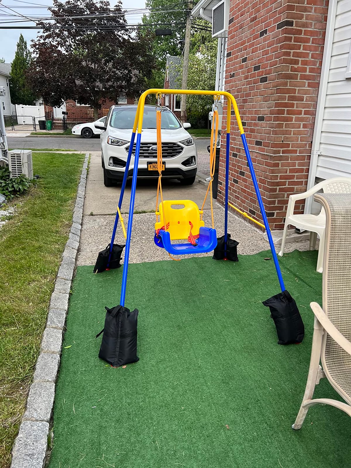 FUNLIO 3‑in‑1 Toddler Swing Set, Foldable Metal Stand with 4 Sandbags,Green customer photo 1
